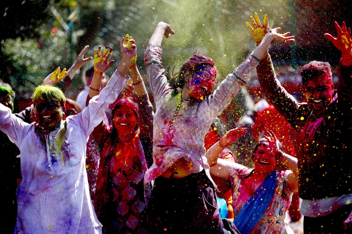 Members of the Nepalese ethnic Madhesi community celebrated the Holi Festival in Kathmandu, Nepal, on March 6. People from Madhesh lowland, who migrated to the capital, celebrated the Hindu spring festival of color. (Narendra Shrestha/EPA)