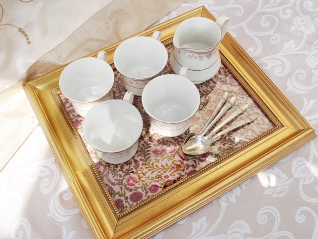 turn old picture frames into serving trays using picture frame as serving tray