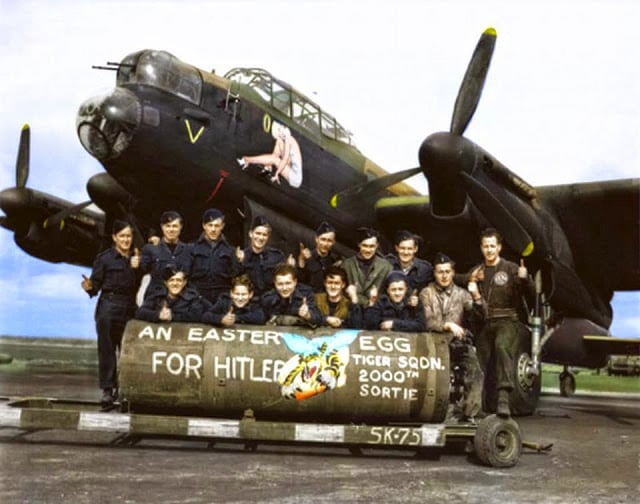 F/L J. F. Thomas and the crew of Avro Lancaster Bomber 'B' MkI 'Victorious Virgin' RF128 QB-V of RCAF 424 Squadron "Tiger" Squadron on the 21st of March 1945. (probably taken at the Skipton-on-Swale, North Yorkshire airfield). (Colorized by Tom Thounaojam from India)