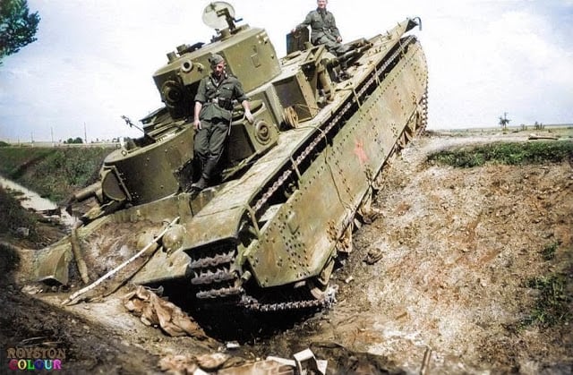 A broken down and deserted Soviet T-35 heavy tank of the 8th Mechanised Corps. On the Dubno - Plycza highway, Rivne Oblast (province) of western Ukraine. June/July 1941. (Colorized by Royston Leonard from the UK)