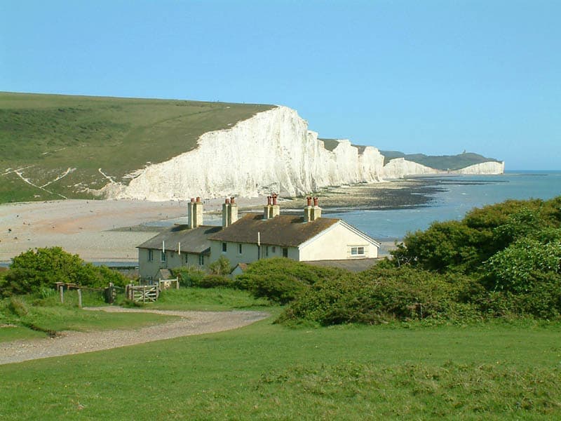Seven Sisters cliffs and the coastguard cottages, from Seaford Head showing Cuckmere Haven (looking east 2003 05 26)
